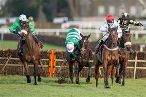 ESHER, ENGLAND - FEBRUARY 18: Page Fuller riding Anythingforlove (red cap) clear the last to win The Jane Seymour Mares' Novices' Hurdle at Sandown Park Racecourse on February 18, 2021 in Esher, England. Due to the coronavirus pandemic, owners along with the paying public will not be allowed to attend the meeting. (Photo by Alan Crowhurst/Getty Images)