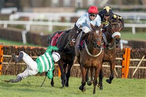 ESHER, ENGLAND - FEBRUARY 18: Jonjo O'Neill Jr. is unseated from Uptown Lady at the last hurdle when challenging at Sandown Park Racecourse on February 18, 2021 in Esher, England. Due to the coronavirus pandemic, owners along with the paying public will not be allowed to attend the meeting. (Photo by Alan Crowhurst/Getty Images)