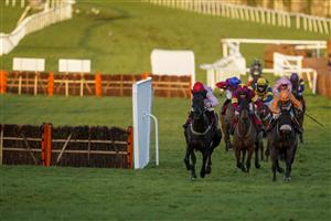 ESHER, ENGLAND - FEBRUARY 18: Millie Wonnacott riding Conkwell Legend (orange) bypass the hurdles in the straight before winning The Richmond Novices' Handicap Hurdle at Sandown Park Racecourse on February 18, 2021 in Esher, England. Due to the coronavirus pandemic, owners along with the paying public will not be allowed to attend the meeting. (Photo by Alan Crowhurst/Getty Images)