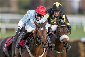 ESHER, ENGLAND - FEBRUARY 18: Page Fuller riding Anythingforlove (red cap) clear the last to win The Jane Seymour Mares' Novices' Hurdle at Sandown Park Racecourse on February 18, 2021 in Esher, England. Due to the coronavirus pandemic, owners along with the paying public will not be allowed to attend the meeting. (Photo by Alan Crowhurst/Getty Images)