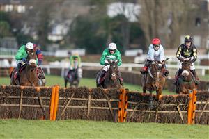 ESHER, ENGLAND - FEBRUARY 18: Page Fuller riding Anythingforlove (red cap) clear the last to win The Jane Seymour Mares' Novices' Hurdle at Sandown Park Racecourse on February 18, 2021 in Esher, England. Due to the coronavirus pandemic, owners along with the paying public will not be allowed to attend the meeting. (Photo by Alan Crowhurst/Getty Images)
