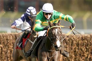 ESHER, ENGLAND - FEBRUARY 18: Niall Houlihan riding Belargus clear the last to win The Elmbridge Handicap Chase at Sandown Park Racecourse on February 18, 2021 in Esher, England. Due to the coronavirus pandemic, owners along with the paying public will not be allowed to attend the meeting. (Photo by Alan Crowhurst/Getty Images)