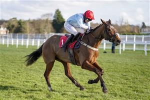 ESHER, ENGLAND - FEBRUARY 18: Page Fuller riding Anythingforlove (red cap) clear the last to win The Jane Seymour Mares' Novices' Hurdle at Sandown Park Racecourse on February 18, 2021 in Esher, England. Due to the coronavirus pandemic, owners along with the paying public will not be allowed to attend the meeting. (Photo by Alan Crowhurst/Getty Images)
