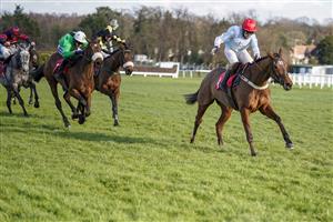 ESHER, ENGLAND - FEBRUARY 18: Page Fuller riding Anythingforlove (red cap) clear the last to win The Jane Seymour Mares' Novices' Hurdle at Sandown Park Racecourse on February 18, 2021 in Esher, England. Due to the coronavirus pandemic, owners along with the paying public will not be allowed to attend the meeting. (Photo by Alan Crowhurst/Getty Images)