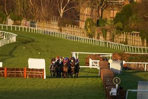 ESHER, ENGLAND - FEBRUARY 18: A general view as runners bypass the hurdles in the straight due to the low sun during The Richmond Novices' Handicap Hurdle at Sandown Park Racecourse on February 18, 2021 in Esher, England. Due to the coronavirus pandemic, owners along with the paying public will not be allowed to attend the meeting. (Photo by Alan Crowhurst/Getty Images)