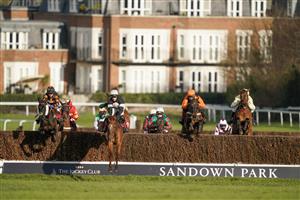 ESHER, ENGLAND - FEBRUARY 18: Harry Skelton riding No Getaway (black/white cap) lead all the way to win The Kingston Handicap Chase at Sandown Park Racecourse on February 18, 2021 in Esher, England. Due to the coronavirus pandemic, owners along with the paying public will not be allowed to attend the meeting. (Photo by Alan Crowhurst/Getty Images)