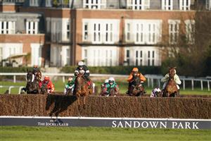 ESHER, ENGLAND - FEBRUARY 18: Harry Skelton riding No Getaway (black/white cap) lead all the way to win The Kingston Handicap Chase at Sandown Park Racecourse on February 18, 2021 in Esher, England. Due to the coronavirus pandemic, owners along with the paying public will not be allowed to attend the meeting. (Photo by Alan Crowhurst/Getty Images)