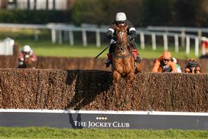 ESHER, ENGLAND - FEBRUARY 18: Harry Skelton riding No Getaway clear the last to win The Kingston Handicap Chase at Sandown Park Racecourse on February 18, 2021 in Esher, England. Due to the coronavirus pandemic, owners along with the paying public will not be allowed to attend the meeting. (Photo by Alan Crowhurst/Getty Images)