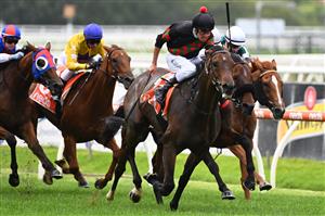 MELBOURNE, AUSTRALIA - FEBRUARY 20: Billy Egan riding Defibrillate wins Race 1, The Neds Mornington Cup Prelude, during Blue Diamond Stakes Day at Caulfield Racecourse on February 20, 2021 in Melbourne, Australia. (Photo by Vince Caligiuri/Getty Images)