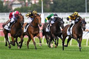 MELBOURNE, AUSTRALIA - FEBRUARY 20: Damian Lane riding Probabeel defeats William Pike riding Arcadia Queen in race 6, the Lamaros Sth Melbourne Futurity Stakes, during Blue Diamond Stakes Day at Caulfield Racecourse on February 20, 2021 in Melbourne, Australia. (Photo by Vince Caligiuri/Getty Images)