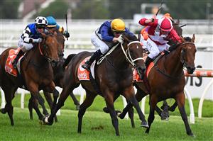 MELBOURNE, AUSTRALIA - FEBRUARY 20: Michael Dee riding Rich Hips to win Race 4, the Premier Signs Mannerism Stakes, during Blue Diamond Stakes Day at Caulfield Racecourse on February 20, 2021 in Melbourne, Australia. (Photo by Vince Caligiuri/Getty Images)