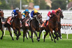 MELBOURNE, AUSTRALIA - FEBRUARY 20: Michael Dee riding Rich Hips to win Race 4, the Premier Signs Mannerism Stakes, during Blue Diamond Stakes Day at Caulfield Racecourse on February 20, 2021 in Melbourne, Australia. (Photo by Vince Caligiuri/Getty Images)