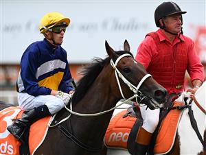 MELBOURNE, AUSTRALIA - FEBRUARY 20: Michael Dee after riding Rich Hips to win Race 4, the Premier Signs Mannerism Stakes, during Blue Diamond Stakes Day at Caulfield Racecourse on February 20, 2021 in Melbourne, Australia. (Photo by Vince Caligiuri/Getty Images)