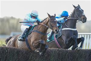 WARWICK, ENGLAND - FEBRUARY 26: Jonathan Burke riding Espoir de Teillee (L) clear the last to win The Budbrooke Handicap Chase at Warwick Racecourse on February 26, 2021 in Warwick, England. Due to the coronavirus pandemic, owners along with the paying public will not be allowed to attend the meeting. (Photo by Alan Crowhurst/Getty Images)