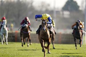 SUNBURY, ENGLAND - FEBRUARY 27: Ciaran Gethings riding Hometown Boy clear the last to win The Close Brothers Asset Finance Handicap Hurdle at Kempton Park Racecourse on February 27, 2021 in Sunbury, England. Due to the coronavirus pandemic, owners along with the paying public will not be allowed to attend the meeting. (Photo by Alan Crowhurst/Getty Images)