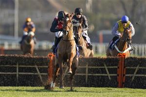 SUNBURY, ENGLAND - FEBRUARY 27: Jonjo O'Neill Jr riding Cape Gentleman (red/black) clear the last to win The Sky Bet Dovecote Novices' Hurdle at Kempton Park Racecourse on February 27, 2021 in Sunbury, England. Due to the coronavirus pandemic, owners along with the paying public will not be allowed to attend the meeting. (Photo by Alan Crowhurst/Getty Images)