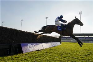 SUNBURY, ENGLAND - FEBRUARY 27: Jonathan Burke riding Clondaw Castle clear the last to win The Close Brothers Handicap Chase at Kempton Park Racecourse on February 27, 2021 in Sunbury, England. Due to the coronavirus pandemic, owners along with the paying public will not be allowed to attend the meeting. (Photo by Alan Crowhurst/Getty Images)