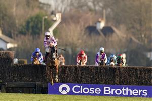SUNBURY, ENGLAND - FEBRUARY 27: Harry Cobden riding My Way (pink) clear the last to win The Close Brothers Motor Finance Handicap Chase at Kempton Park Racecourse on February 27, 2021 in Sunbury, England. Due to the coronavirus pandemic, owners along with the paying public will not be allowed to attend the meeting. (Photo by Alan Crowhurst/Getty Images)