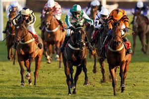 SUNBURY, ENGLAND - FEBRUARY 27: Nico de Boinville riding Guardino (green) win The Close Brothers Premium Finance Standard Open NH Flat Race at Kempton Park Racecourse on February 27, 2021 in Sunbury, England. Due to the coronavirus pandemic, owners along with the paying public will not be allowed to attend the meeting. (Photo by Alan Crowhurst/Getty Images)