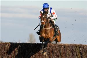 NEWBURY, ENGLAND - MARCH 06: Bryony Frost riding Hitman clear the last to win The BetVictor Novices' Chase at Newbury Racecourse on March 06, 2021 in Newbury, England. Due to the coronavirus pandemic, owners along with the paying public will not be allowed to attend the meeting. (Photo by Alan Crowhurst/Getty Images)
