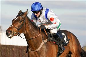 NEWBURY, ENGLAND - MARCH 06: Bryony Frost riding Hitman clear the last to win The BetVictor Novices' Chase at Newbury Racecourse on March 06, 2021 in Newbury, England. Due to the coronavirus pandemic, owners along with the paying public will not be allowed to attend the meeting. (Photo by Alan Crowhurst/Getty Images)