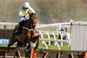 NEWBURY, ENGLAND - MARCH 06: Harry Bannister riding Millers Bank clear the last to win The BetVictor Handicap Hurdle at Newbury Racecourse on March 06, 2021 in Newbury, England. Due to the coronavirus pandemic, owners along with the paying public will not be allowed to attend the meeting. (Photo by Alan Crowhurst/Getty Images)