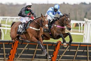 NEWBURY, ENGLAND - MARCH 06: Tom Buckley riding Always Resolute (L) clear the last to win The BetVictor Seniors' Handicap Hurdle at Newbury Racecourse on March 06, 2021 in Newbury, England. Due to the coronavirus pandemic, owners along with the paying public will not be allowed to attend the meeting. (Photo by Alan Crowhurst/Getty Images)