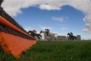 NEWBURY, ENGLAND - MARCH 06: Lorcan Murtagh riding Sir Ivan (L) clear the last to win The BetVictor Veterans' Handicap Chase at Newbury Racecourse on March 06, 2021 in Newbury, England. Due to the coronavirus pandemic, owners along with the paying public will not be allowed to attend the meeting. (Photo by Alan Crowhurst/Getty Images)