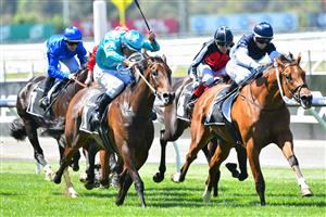 MELBOURNE, AUSTRALIA - MARCH 06: Jamie Kah riding Cumberbatch winning Race 2, the 2021 Lexus Melbourne Cup Tour, during Melbourne Racing at Flemington Racecourse on March 06, 2021 in Melbourne, Australia. (Photo by Vince Caligiuri/Getty Images)