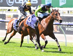 MELBOURNE, AUSTRALIA - MARCH 06: Jamie Mott riding La Rocque to win Race 1, The Tbv Thoroughbred Breeders Stakes, during Melbourne Racing at Flemington Racecourse on March 06, 2021 in Melbourne, Australia. (Photo by Vince Caligiuri/Getty Images)