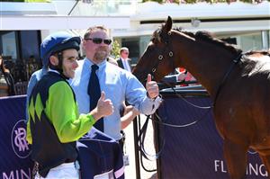 MELBOURNE, AUSTRALIA - MARCH 06: Jamie Mott poses with trainer John McArdle after riding La Rocque to win Race 1, The Tbv Thoroughbred Breeders Stakes, during Melbourne Racing at Flemington Racecourse on March 06, 2021 in Melbourne, Australia. (Photo by Vince Caligiuri/Getty Images)