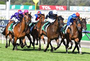 MELBOURNE, AUSTRALIA - MARCH 06: Jye McNeil riding Homesman winning Race 8, the Tab Australian Cup, during Melbourne Racing at Flemington Racecourse on March 06, 2021 in Melbourne, Australia. (Photo by Vince Caligiuri/Getty Images)