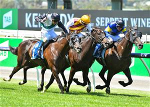 MELBOURNE, AUSTRALIA - MARCH 06: Mark Zahra riding So Si Bon (L) defeats Pretty Brazen and Holbien in Race 3, the Furphy Ale March Stakes, during Melbourne Racing at Flemington Racecourse on March 06, 2021 in Melbourne, Australia. (Photo by Vince Caligiuri/Getty Images)