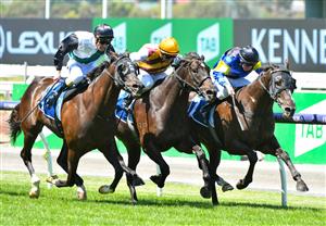 MELBOURNE, AUSTRALIA - MARCH 06: Mark Zahra riding So Si Bon (L) defeats Pretty Brazen and Holbien in Race 3, the Furphy Ale March Stakes, during Melbourne Racing at Flemington Racecourse on March 06, 2021 in Melbourne, Australia. (Photo by Vince Caligiuri/Getty Images)