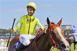 SYDNEY, AUSTRALIA - MARCH 06: Nash Rawiller on Eduardo returns to scale after winning race 5 the Hyland Race Colours from James McDonald on Nature Strip during Sydney Racing at Royal Randwick Racecourse on March 06, 2021 in Sydney, Australia. (Photo by Mark Evans/Getty Images)