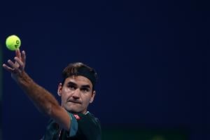 DOHA, QATAR - MARCH 10: Roger Federer of Switzerland serves in his match against Dan Evans of Great Britain on Day 3 of the Qatar ExxonMobil Open at Khalifa International Tennis and Squash Complex on March 10, 2021 in Doha, Qatar. (Photo by Mohamed Farag/Getty Images)