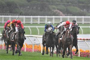 MELBOURNE, AUSTRALIA - MARCH 13: Teodore Nugent riding Air Defence winning Race 7, the Powerflo Solutions Vobis Gold Reef during Melbourne Racing All-Star Mile Day at Moonee Valley Racecourse on March 13, 2021 in Melbourne, Australia. (Photo by Vince Caligiuri/Getty Images)