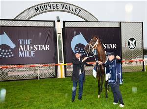MELBOURNE, AUSTRALIA - MARCH 13: Trainer Kris Lees poses with Mugatoo after winning Race 8, the All-star Mile, during Melbourne Racing All-Star Mile Day at Moonee Valley Racecourse on March 13, 2021 in Melbourne, Australia. (Photo by Vince Caligiuri/Getty Images)