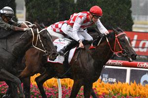 MELBOURNE, AUSTRALIA - MARCH 13: Teodore Nugent riding Air Defence winning Race 7, the Powerflo Solutions Vobis Gold Reef, during Melbourne Racing All-Star Mile Day at Moonee Valley Racecourse on March 13, 2021 in Melbourne, Australia. (Photo by Vince Caligiuri/Getty Images)