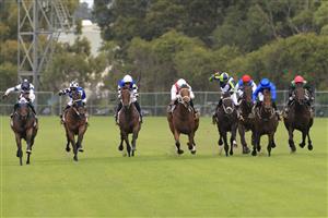 SYDNEY, AUSTRALIA - MARCH 13: Tom Marquand on Toffee Tongue (red/white) wins race 4 the Bisley Workwear Sky High Stakes during Sydney Racing at Rosehill Gardens on March 13, 2021 in Sydney, Australia. (Photo by Mark Evans/Getty Images)