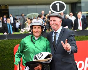 MELBOURNE, AUSTRALIA - MARCH 13: Trainer John Moloney poses with Damien Oliver after he riding Scorched Earth to win Race 2, the Charter Keck Cramer Valley Pearl, during Melbourne Racing All-Star Mile Day at Moonee Valley Racecourse on March 13, 2021 in Melbourne, Australia. (Photo by Vince Caligiuri/Getty Images)