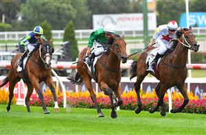MELBOURNE, AUSTRALIA - MARCH 13: Damien Oliver riding Scorched Earth winning Race 2, the Charter Keck Cramer Valley Pearl, during Melbourne Racing All-Star Mile Day at Moonee Valley Racecourse on March 13, 2021 in Melbourne, Australia. (Photo by Vince Caligiuri/Getty Images)