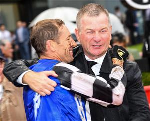 MELBOURNE, AUSTRALIA - MARCH 13: Trainer Kris Lees and Hugh Bowman celebrate after Mugatoo won Race 8, the All-star Mile, during Melbourne Racing All-Star Mile Day at Moonee Valley Racecourse on March 13, 2021 in Melbourne, Australia. (Photo by Vince Caligiuri/Getty Images)