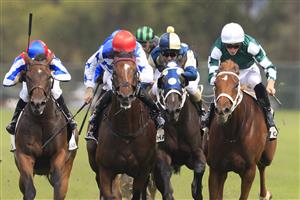 SYDNEY, AUSTRALIA - MARCH 13: James McDonald on Hungry Heart (green/white) wins race 6 the Chandon Phar Lap Stakes during Sydney Racing at Rosehill Gardens on March 13, 2021 in Sydney, Australia. (Photo by Mark Evans/Getty Images)