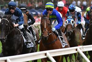 MELBOURNE, AUSTRALIA - MARCH 13: Jamie Kah riding Grandslam in the first lap before winning race 5, the IDalton Consulting Alister Clark Stakes, during Melbourne Racing All-Star Mile Day at Moonee Valley Racecourse on March 13, 2021 in Melbourne, Australia. (Photo by Vince Caligiuri/Getty Images)