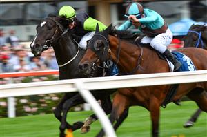 MELBOURNE, AUSTRALIA - MARCH 13: Matthew Cartwright riding Persan defeats Michael Walker riding Irish Flame in Race 3, the Xtreme Freight Handicap, during Melbourne Racing All-Star Mile Day at Moonee Valley Racecourse on March 13, 2021 in Melbourne, Australia. (Photo by Vince Caligiuri/Getty Images)