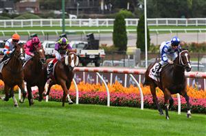 MELBOURNE, AUSTRALIA - MARCH 13: Michael Poy riding Ancestry to win Race 4, the Ranvet Abell Stakes, during Melbourne Racing All-Star Mile Day at Moonee Valley Racecourse on March 13, 2021 in Melbourne, Australia. (Photo by Vince Caligiuri/Getty Images)