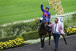 SYDNEY, AUSTRALIA - MARCH 13: Tim Clark on Krone returns to scale after winning race 7 the Coolmore Classic during Sydney Racing at Rosehill Gardens on March 13, 2021 in Sydney, Australia. (Photo by Jason McCawley/Getty Images for Australian Turf Club)