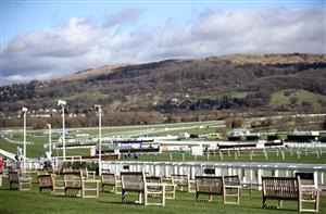 CHELTENHAM, ENGLAND - MARCH 16: Empty benches overlook the racetrack ahead of day one of the Cheltenham Festival at Cheltenham Racecourse, on March 16, 2021 in Cheltenham, England. Sporting venues around the UK remain under strict restrictions due to the Coronavirus Pandemic as Government social distancing laws prohibit spectators inside venues resulting in events being held behind closed doors. (Photo by Tim Goode - Pool/Getty Images)