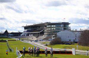 CHELTENHAM, ENGLAND - MARCH 16: Runners make their way down the home straight towards the empty grandstands on the first circuit during the Sky Bet Supreme Novices' Hurdle (Grade 1) on Day One of the Cheltenham Festival at Cheltenham Racecourse on March 16, 2021 in Cheltenham, England. Sporting venues around the UK remain under strict restrictions due to the Coronavirus Pandemic as Government social distancing laws prohibit spectators inside venues resulting in events being held behind closed doors. (Photo by Michael Steele/Getty Images)